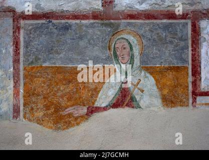 Santa con croce - affresco - pittore lombardo - 1507 - Mezzate di Bagnatica (Bg) ,Italia,chiesa di San Pietro Stock Photo