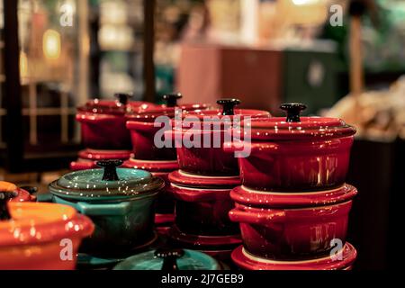 Small Dutch stoves in a shop window, miniature crockery. Stock Photo