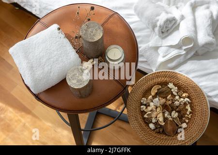 Spa composition with candles and towel, top view. Stock Photo