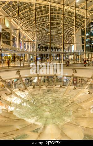 Water Tornado Fountain in front of the Marina Bay Sands Shopping Centre, Singapore Stock Photo