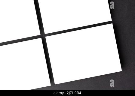 Mockup with several business cards lined up on elegant textured black background Stock Photo