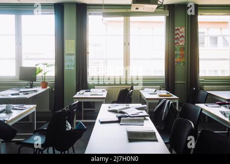 Empty classroom with chairs and desks Stock Photo