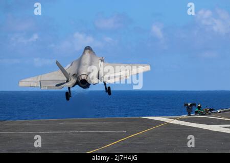 Philippine Sea, United States. 08 May, 2022. A U.S. Marine Corps F-35C Lightning II fighter aircraft assigned to the Black Knights of Marine Fighter Attack Squadron 314, launches off the flight deck of the aircraft carrier USS Abraham Lincoln during routine patrol May 8, 2022 in the Philippine Sea.  Credit: MC3 Javier Reyes/Planetpix/Alamy Live News Stock Photo