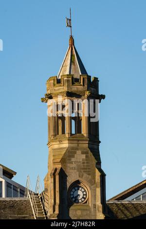 Architectural detail of the clock tower on the Carlisle Train Station.  Also known as the Carlisle Citadel this building is Grade ll listed. Stock Photo