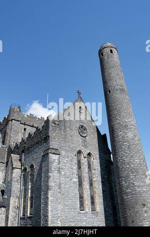 Kilkenny, Ireland- April 20, 2022: Cathedral Church of St Canice and Round Tower in Kilkenny Ireland. Stock Photo