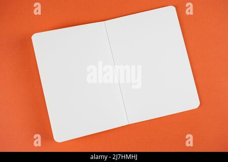 Empty open notebook with white blank paper page Stock Photo