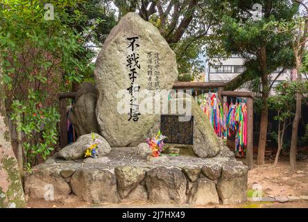 nagasaki, kyushu - december 11 2021: Monument hoping a peace without war erected by the Construction worker craftsmans and the Memorial to the victims Stock Photo