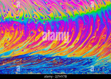 Psychedelic multicolored background abstract. Rainbow colors. patterns background. Photo macro shot of soap bubbles Stock Photo