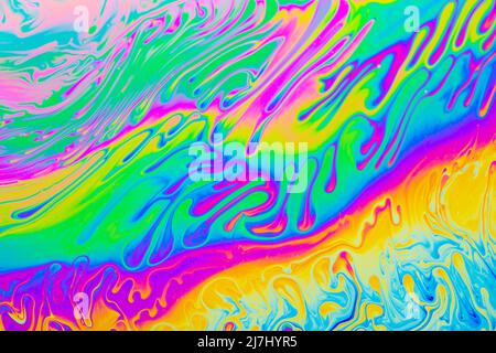 Psychedelic multicolored background abstract. Rainbow colors. patterns background. Photo macro shot of soap bubbles Stock Photo