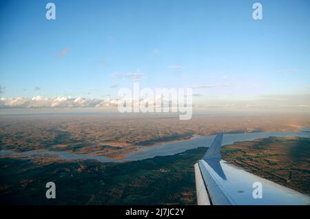 View of Potomac river from Air Plane, with the wing in view. Stock Photo