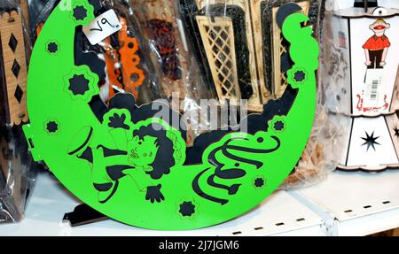 Giza, Egypt, March 14 2022: Islamic wooden green crescent with Ramadan decoration and Arabic text on it, Translation (Happy Ramadan) as a Ramadan deco Stock Photo