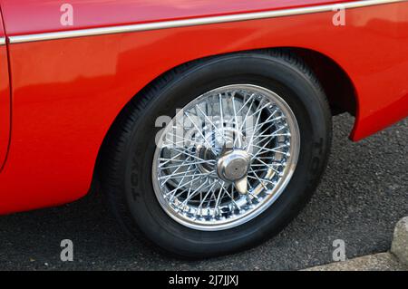 A sports car parked  by the roadside Stock Photo