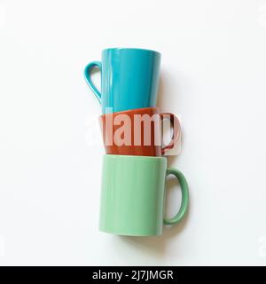 Colorful mug cup isolated on white background. top view, copy space Stock Photo