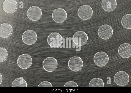 Induction frying pan bottom. Metal texture. Extrem close-up. High resolution photo. Full depth of field. Stock Photo