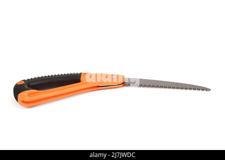 Folding garden saw in the folded state isolated on a white background, pocket saw. High resolution photo. Full depth of field. Stock Photo