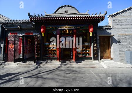 South Luogu lane with its old traditional houses runs through hutong neighborhoods in Doncheng district in Beijing, China. Stock Photo