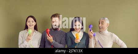 Banner shot of employees talk on landline phone Stock Photo