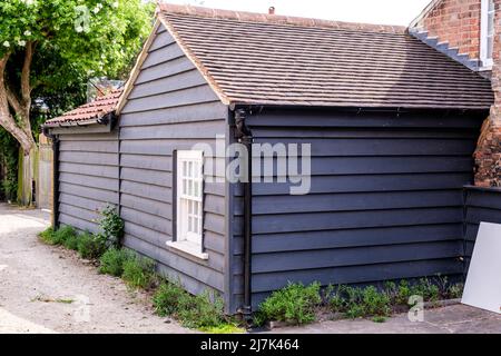Epsom Surrey, London, May 09 2022, Traditional Residential House Extension Using Planks Of Wood Stock Photo