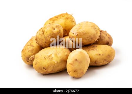 Heap of young potato isolated on white background with clipping path included. Organic potato right from the garden Stock Photo