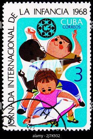 MOSCOW, RUSSIA - MARCH 27, 2022: Postage stamp printed in Cuba shows Children at Play, International Children Day serie, circa 1968 Stock Photo