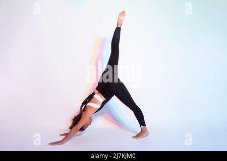 18 Standing Yoga Poses to Challenge Your Balance & Stability - Welltech