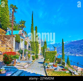 MORCOTE, SWITZERLAND - MARCH 25, 2022: The alley of Monumental Cemetery, located on the mountain slope, observing Lake Lugano, on March 25 in Morcote, Stock Photo