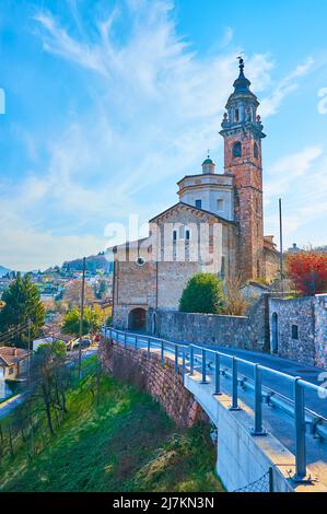 Historic stone building of St George and St Andrew Parish Church, located in Carona, Ticino, Switzerland Stock Photo