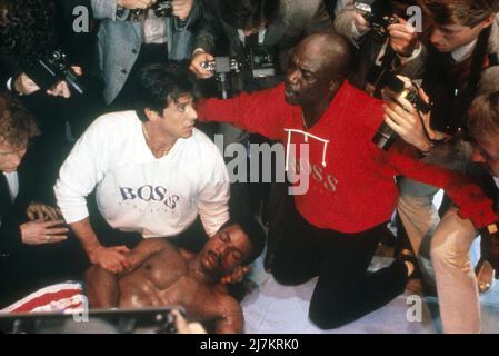 Rocky IV Year : 1985 USA Director : Sylvester Stallone Sylvester Stallone, Carl Weathers, Tony Burton Stock Photo