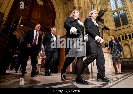 British Labour Party opposition leader Keir Starmer and Britain's Prime Minister Boris Johnson pass a statue of former Prime Minister Margaret Thatcher as they walk through the Members' Lobby following the State Opening speech of Parliament at the Palace of Westminster in London, Britain, May 10, 2022. REUTERS/Toby Melville/Pool