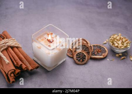 Burning scented candles for relax on black background  Stock Photo