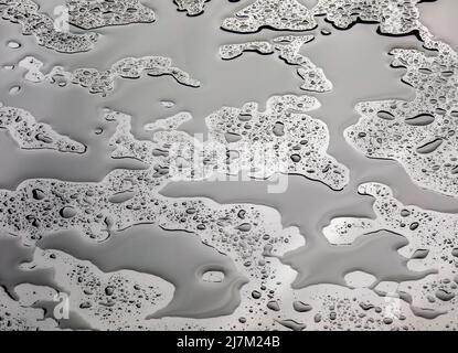 Water on a shiny surface. Stock Photo