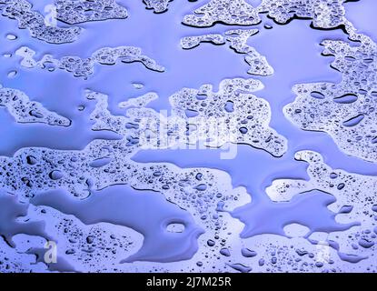 Water on a shiny surface. Stock Photo