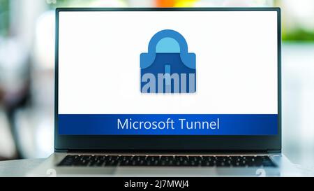 POZNAN, POL - NOV 20, 2021: Laptop computer displaying logo of Microsoft Tunnel Stock Photo