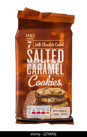 Packet of 7 Milk Chocolate Coated Salted Caramel Cookies from M&S isolated on white background Stock Photo