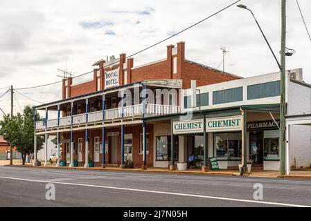 The Royal Hotel and a chemist / pharmacy in Dunedoo, New South Wales Stock Photo