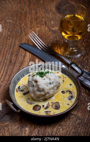 bread dumpling in mushroom sauce Stock Photo