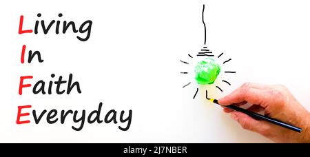 LIFE living in faith everyday symbol. Concept words LIFE living in ...