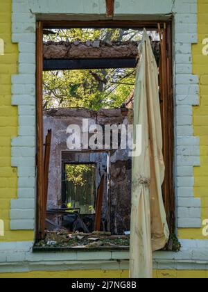 Kharkiv region, Skovorodinovka, Skovorodinivka, Ukraine - 05.09.2022: Airstrike on residential area make damage hole in historical house destroyed Stock Photo