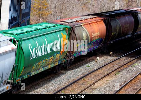 Freight train with grain rail cars. Hamilton Ontario Canada Stock Photo