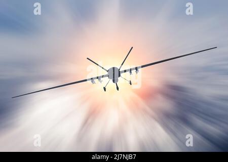 Unmanned military drone uav flying at high speed in the clouds. Stock Photo