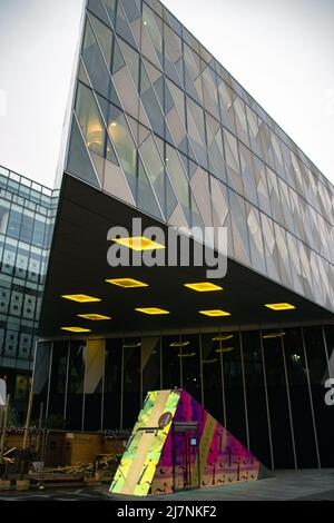 Contemporary triangular-shaped glass office building, located in Deansgate, Manchester, Greater Manchester, United Kingdom. Stock Photo