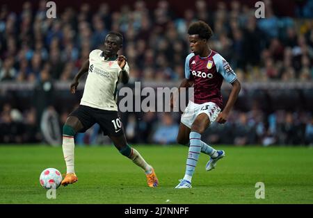 Liverpool's Sadio Mane (left) and Aston Villa's Carney Chukwuemeka during the Premier League match at Villa Park, Birmingham. Picture date: Tuesday May 10, 2022. Stock Photo