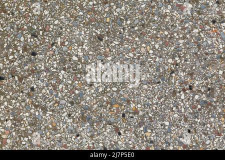 old textured floor background with seamless small irregular stones Stock Photo