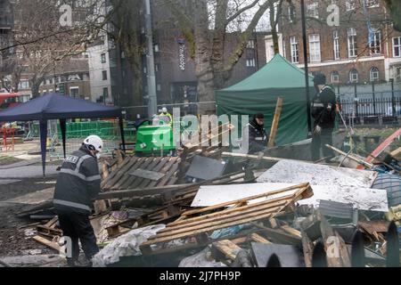 Bailiffs work on site to evict a group of HS2 activists who are living in unstable tunnels underneath Euston Square Gardens in Central London Featuring: Atmosphere Where: London, United Kingdom When: 01 Feb 2021 Credit: Phil Lewis/WENN Stock Photo