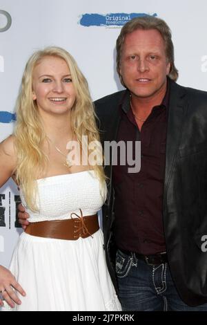 LOS ANGELES - APR 22:  Mandy Hansen, Sig Hansen at the 'Deadliest Catch' Season 10 Premiere Screening at ArcLight Hollywood Theaters on April 22, 2014 in Los Angeles, CA Stock Photo