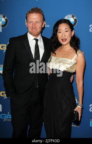 LOS ANGELES - JAN 25:  Kevin McKidd, Sandra Oh at the 66th Annual Directors Guild of America Awards at Century Plaza Hotel on January 25, 2014 in Century City, CA Stock Photo