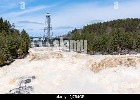 The St Maurice river at the Shawinigan devil’s hole during the spring floods, Quebec, Canada Stock Photo