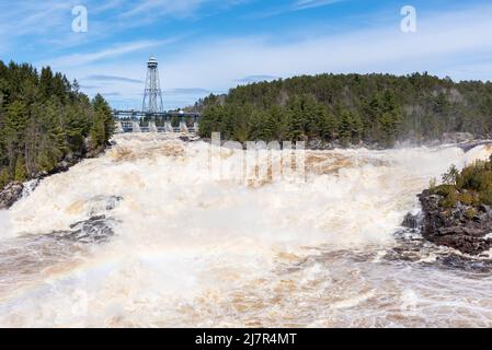 The St Maurice river at the Shawinigan devil’s hole during the spring floods, Quebec, Canada Stock Photo