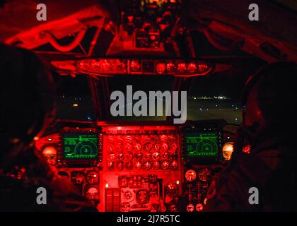 69th Bomb Squadron B-52H Stratofortress Pilots Capt. Jake 'Aftr' Gill (left) and Capt. David 'Lumber' Mills (right) prepare for takeoff on May 3, 2022, at Minot Air Force Base, North Dakota. The advanced targeting and image processing technology significantly increases the combat effectiveness of the B-52 during the day, night and less than ideal weather conditions when attacking ground targets with a variety of standoff weapons. (U.S. Air Force photo by Senior Airman Michael A. Richmond) Stock Photo