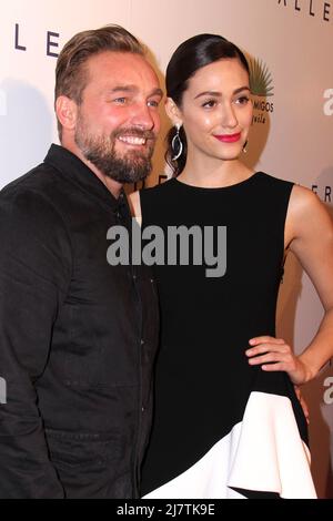 LOS ANGELES - OCT 23:  Brian Bowen Smith, Emmy Rossum at the De Re Gallery & Casamigos Host The Opening Brian Bowen Smith's 'Wildlife' Show at De Re Gallery on October 23, 2014 in West Hollywood, CA Stock Photo